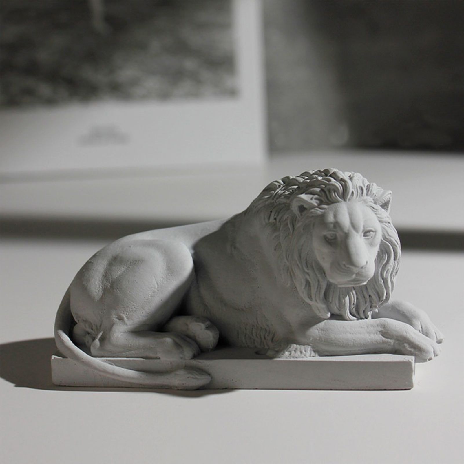 Classic Reclining Lion Sculpture Minimalist Grey Plaster Desk Ornament for Living Room, Study, or Office Decoration